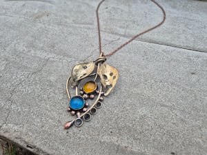 Blue and yellow bullet cussings necklace 