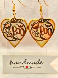 Image 3 of Handcrafted Resin Glow In The Dark Heart Shaped Pumkin " Boo" Earrings 
