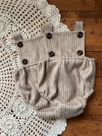 Image 1 of Raymond Sitter Romper
