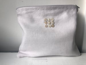 Image of moon pale lilac bag with ecru buttons