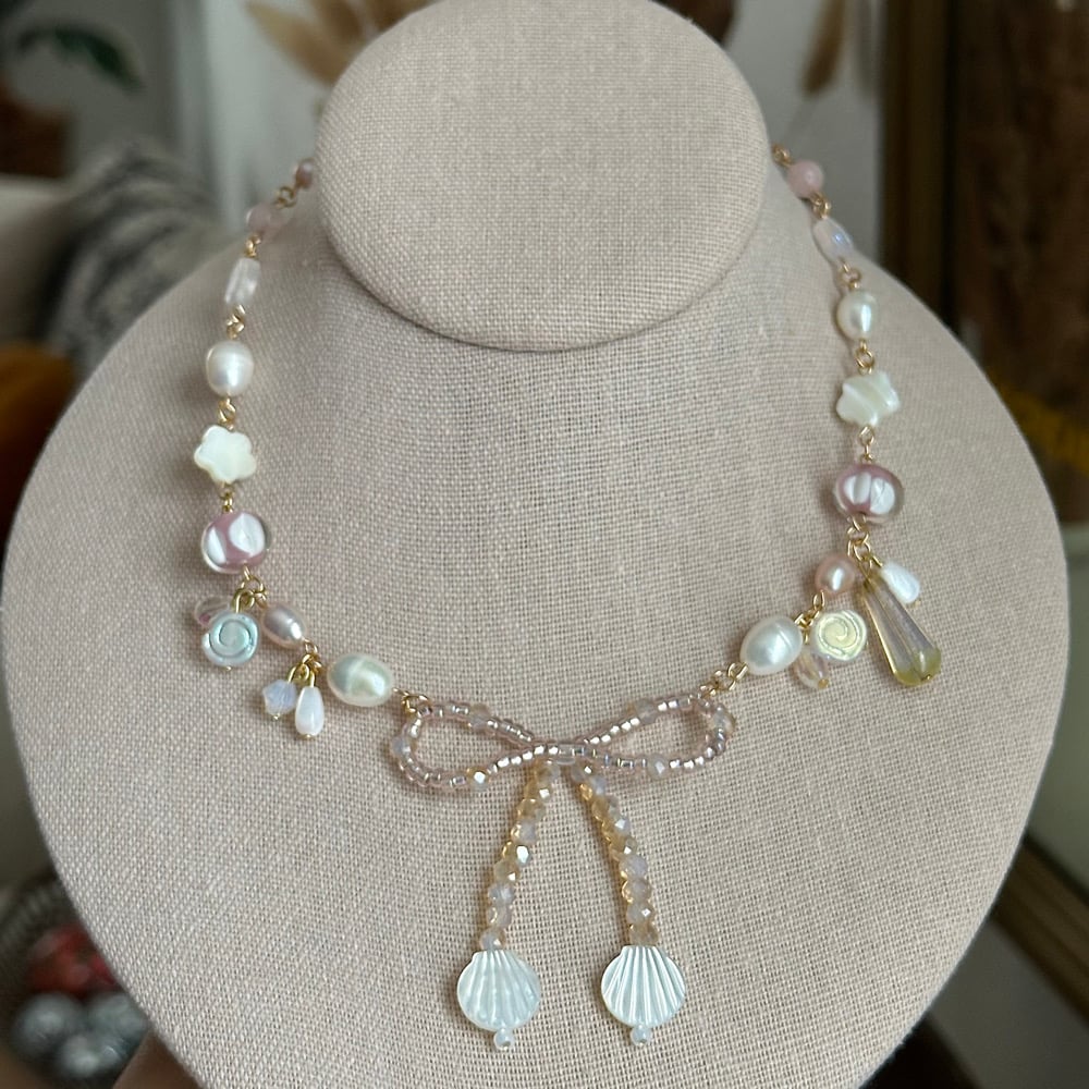 Image of mother of pearl bow