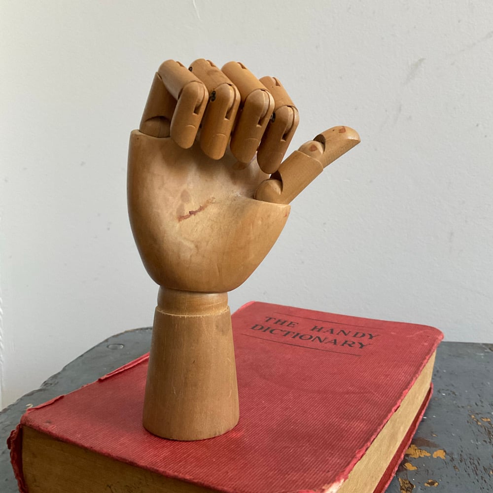 Image of Small Articulated Hand & Dictionary 