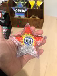 Image 15 of Snow shaped Rock ‘n’ Roll snow globes