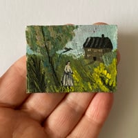 Girl walking in a spring landscape 