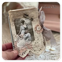 Image 4 of vintage snippet book with a window