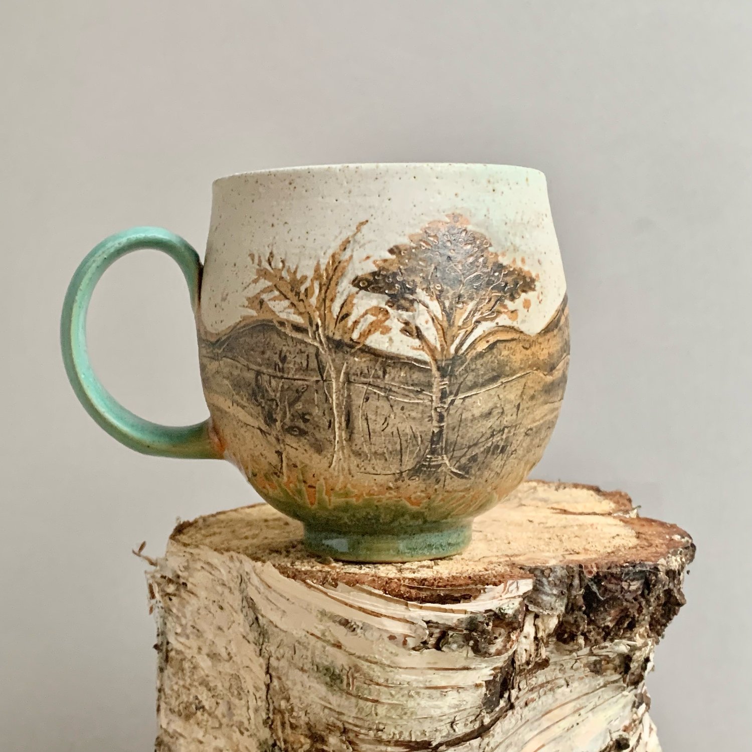 Image of Cup with trees 