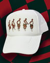 “HOW TO STRAP UP” TRUCKER HAT 
