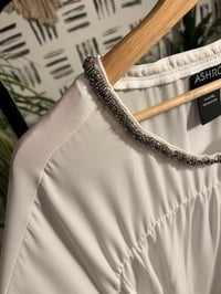 Image 3 of white sheer high /low puff sleeve beaded neck top