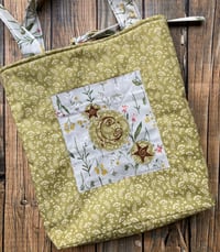 Image 3 of moth garden quilted bag