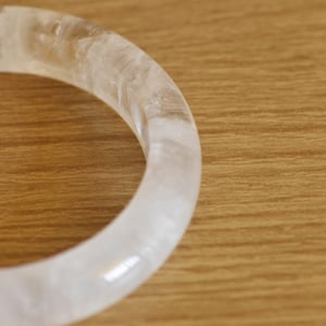 Image of Craved natural Clear Quartz antique style bangle