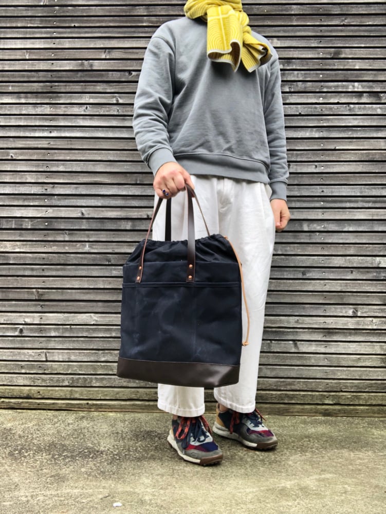 Image of Draw string closure large tote bag in black waxed canvas