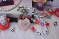 Image 1 of 'eclipse' LOONA keychain