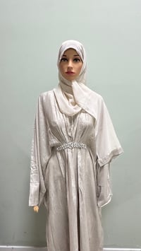 Image 2 of Korean shimmer fabric Puff sleeve abaya close comes with a matching scarf 