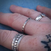 Image 2 of ‘Echo’ hand stamped Sterling Silver Stacking Ring - sunburst pattern