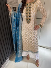 Image 1 of thamana