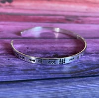 Image 2 of Aztec symbol stamped sterling cuff bracelet (4mm wide). Hand stamped silver 925 bracelet.