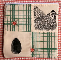 Image 1 of Egg/Hennie Quilted pouch (red stars)