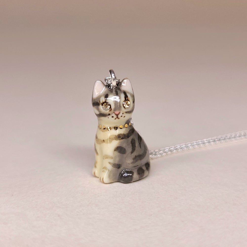 Image of Dark Grey Tabby Porcelain & Sterling Silver Sitting Kitten Pendant