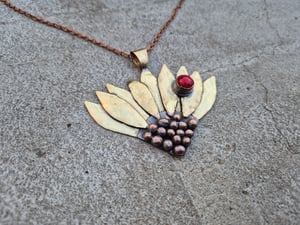 Sunflower pendant with ladybug 