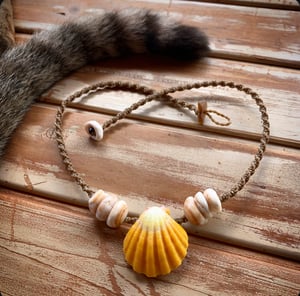 Image of Hawaiian sunrise shell necklace with golden pukas and a locking seaglass clasp