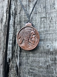 Image 1 of Hobo Nickel in Lignum vitae wood. 