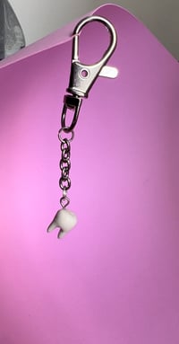 Image 5 of micro tooth charm