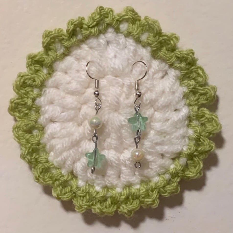 Image of green star earrings