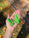 green scissor earrings