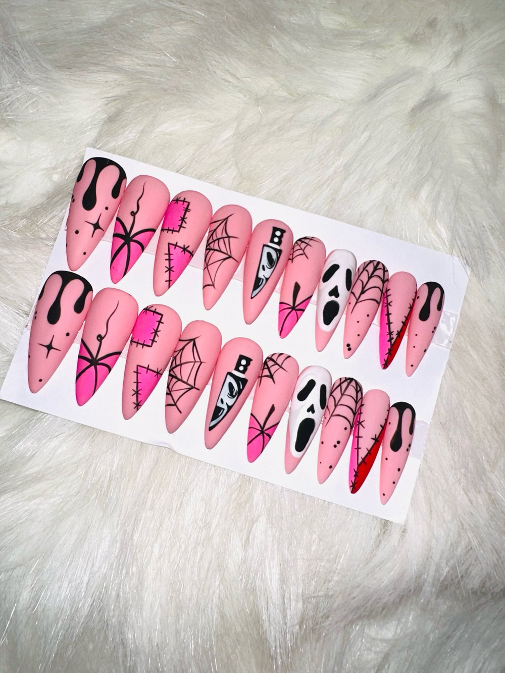 Image of 20 piece one size fits all Scream long stiletto press on nails