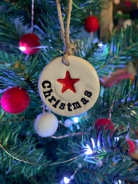 Image 2 of Christmas tag and a red star tag