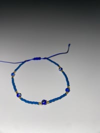 Image 1 of Blue evil eye blue bracelet 