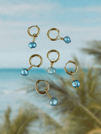 Image 1 of Gold Ocean Blue Pearl Huggies