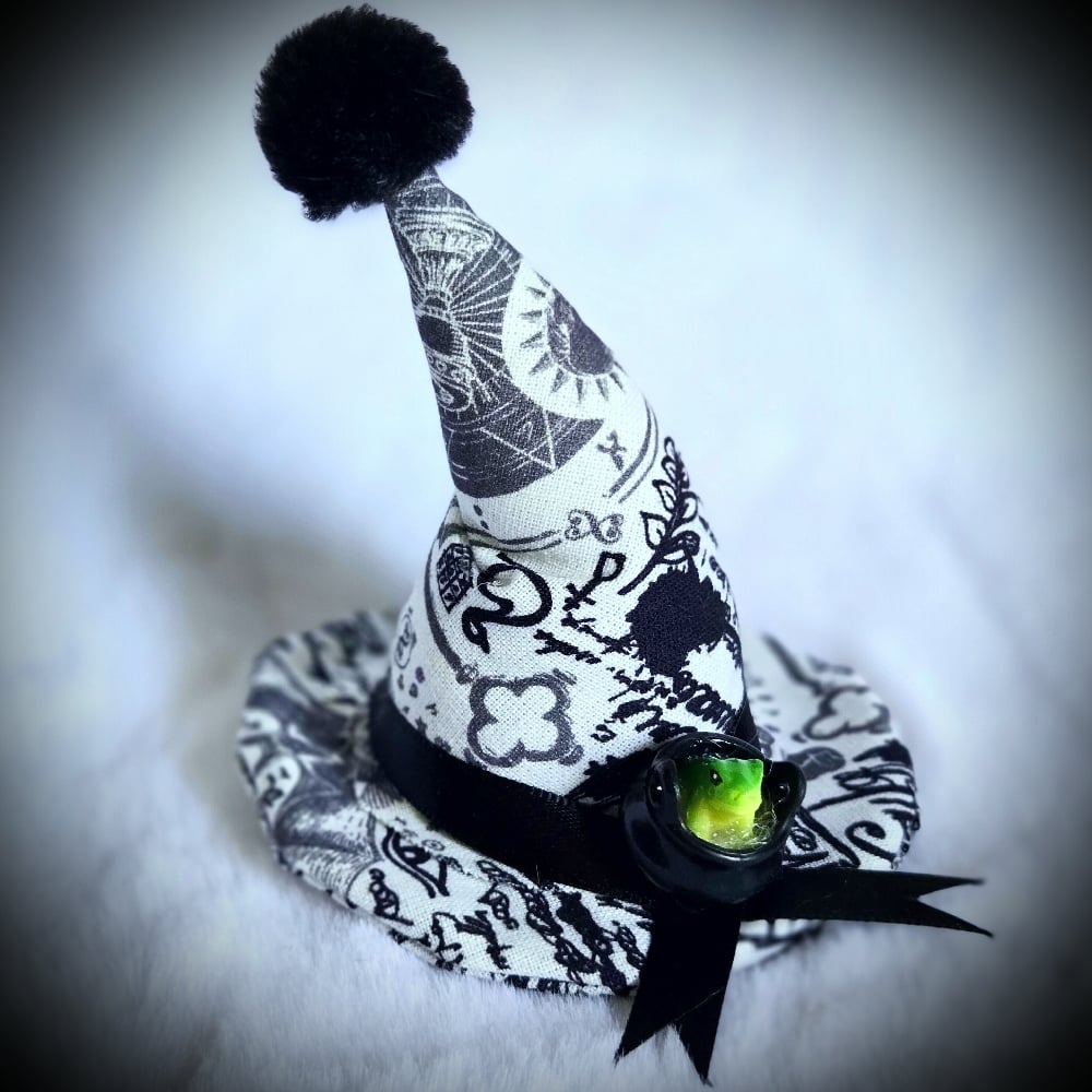 Image of White Toad Cauldron Hat Clip