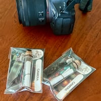 Image 2 of Camera - Message in a Bottle
