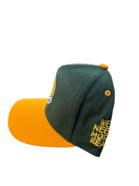 Image 2 of Green and yellow snaps back 