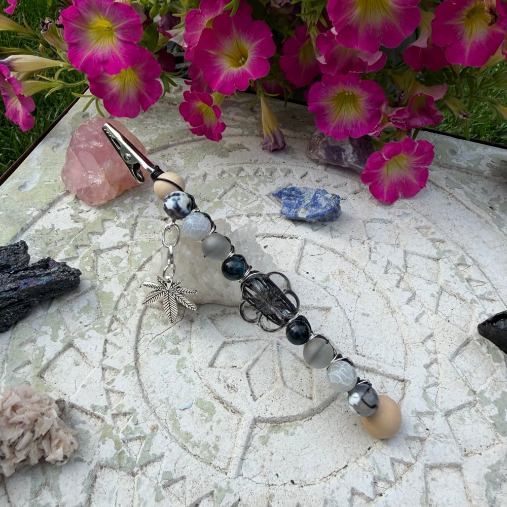 Image of obsidian petals roach clip