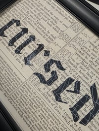 Image 1 of "CURSED" 1800's bible page with preserved spider web  A