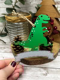 Image 1 of Dino with banner