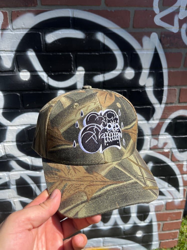 Image of Upset camo hat (black)