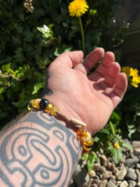 Image 4 of Amber and Jet mixed beads. 