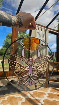 Image 1 of Praying to the sun