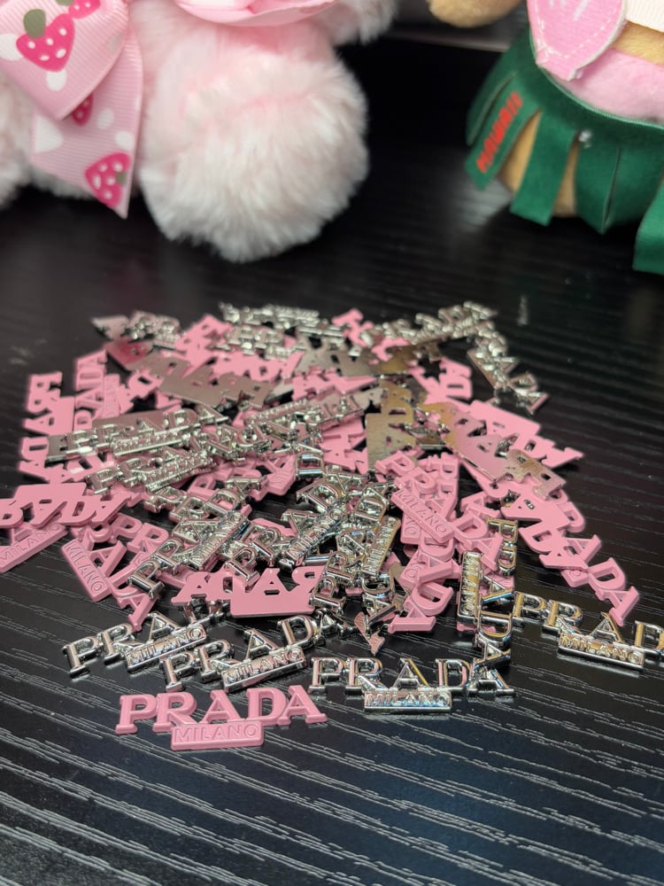 Image of prada sign charms