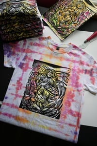 Image 1 of “A vision, held close.” Block Print T-Shirt