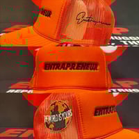 Image 4 of Bold Orange “ENTRAPRENEUR” Trucker Hat – The World Is Yours