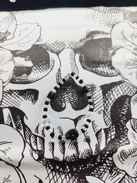 Image 2 of Iridescent Glass Black Skulls
