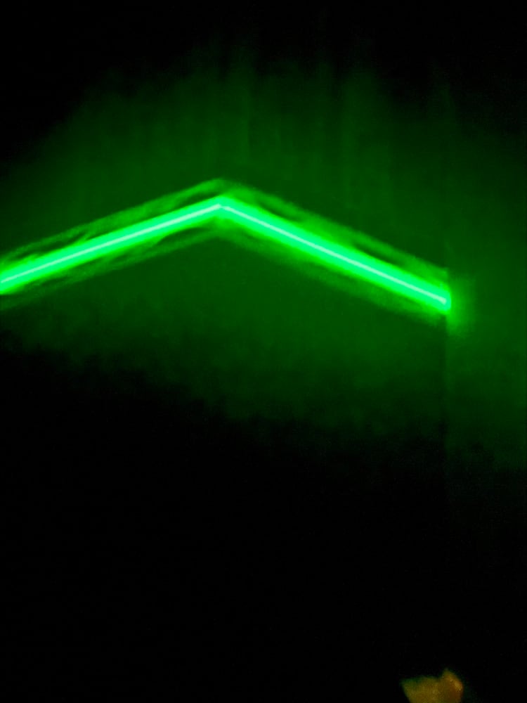 Image of @Kaoticartworks Resin & Green Grip-Tec GLOW Segmented Knife Scales