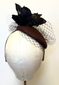 Image 2 of Brown felt button 