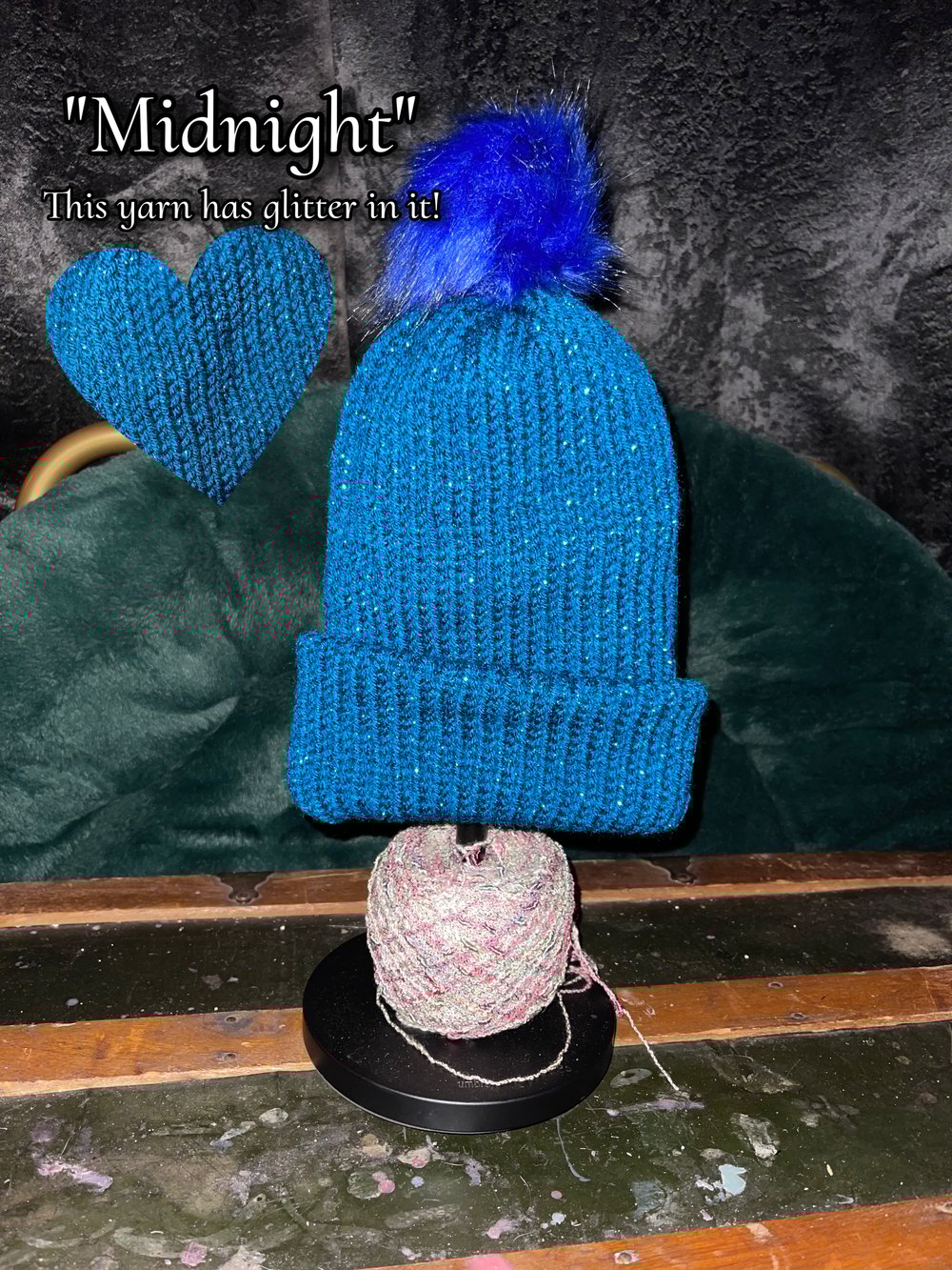 Image of Knitted Beanie With Puff Ball