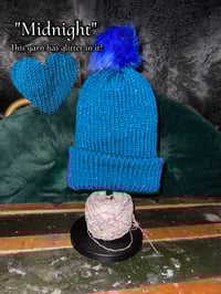 Image 8 of Knitted Beanie With Puff Ball