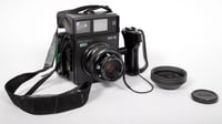 Image 1 of Polaroid 600 SE camera with 127mm F4.7 lens + back #5898